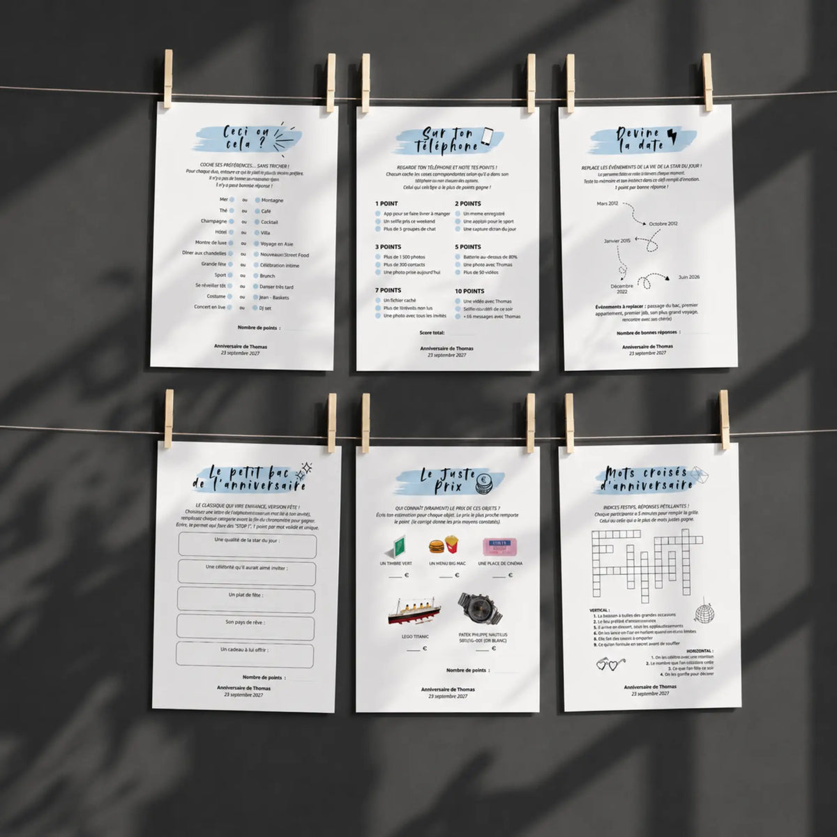 Mockup de fiches de jeux d'anniversaire homme personnalisables, thème bleu, présentées sur fil suspendu