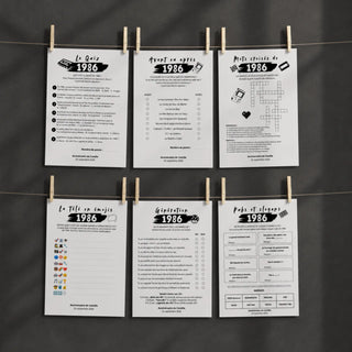 Jeux d'anniversaire année 1986 à imprimer, plusieurs fiches (quiz, avant ou après, mots croisés...) suspendues sur un fil