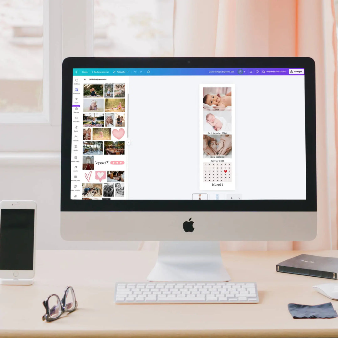Ecran d'ordinateur montrant un écran Canva avec un modèle de marque-page baptême garçon.